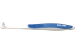 End tuft toothbrush